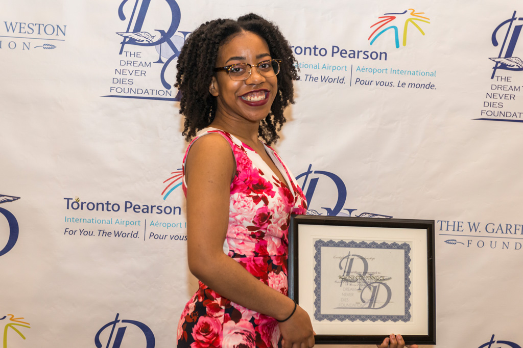 Scholarship recipient with certificate